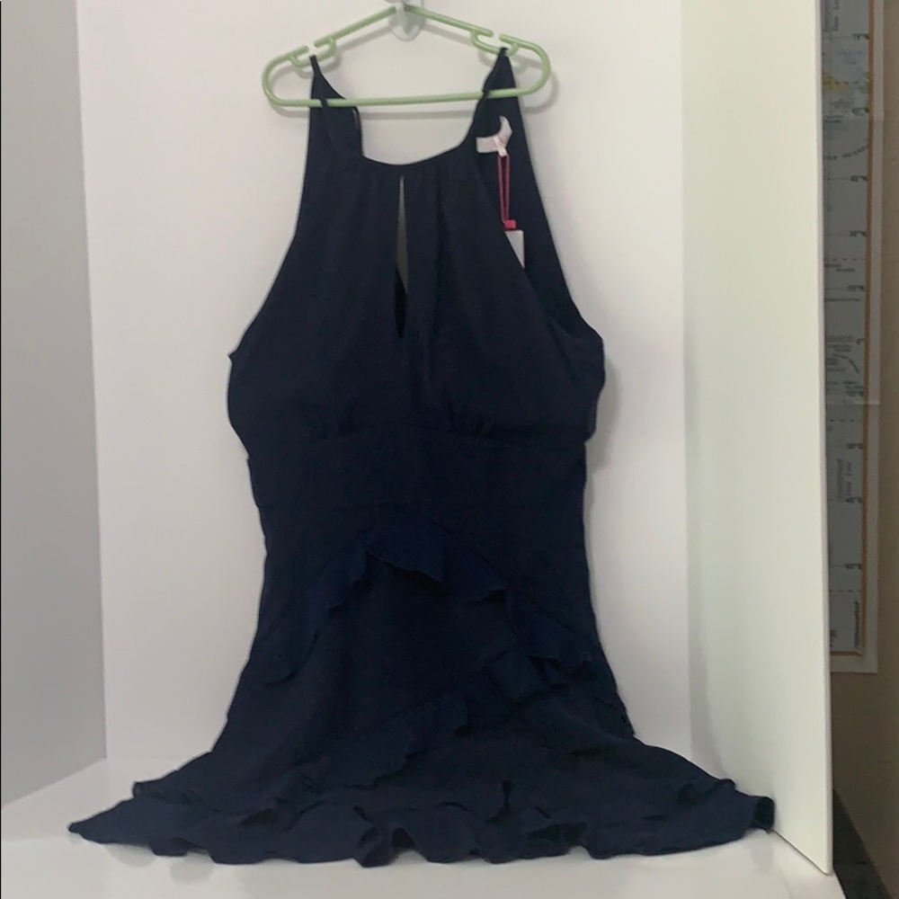 Pixie sleeveless for to flare ruffle mini